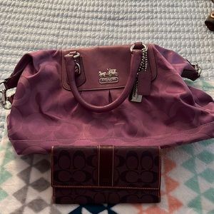 purple Coach purse with wallet